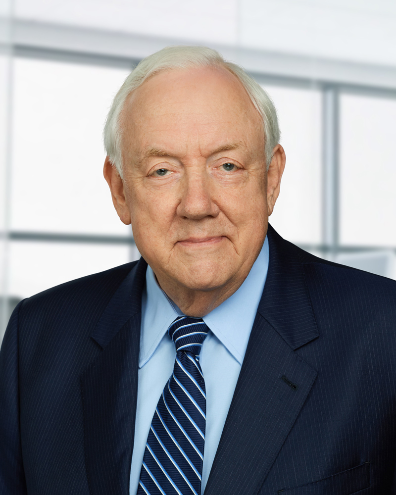 Headshot of Jim Forbes in a suit and tie